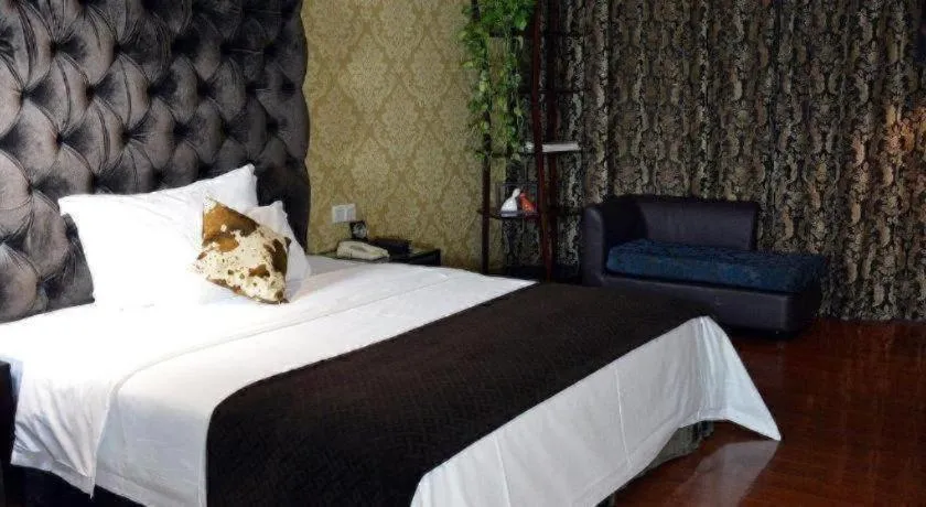 Bed in Dongguan Silver World Garden Hotel