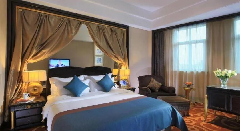 Bed in Dongguan Silver World Garden Hotel