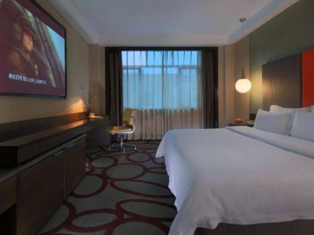 Bed in Dongguan Silver World Garden Hotel