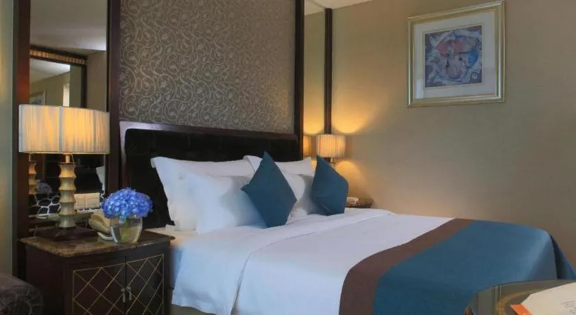 Bed in Dongguan Silver World Garden Hotel