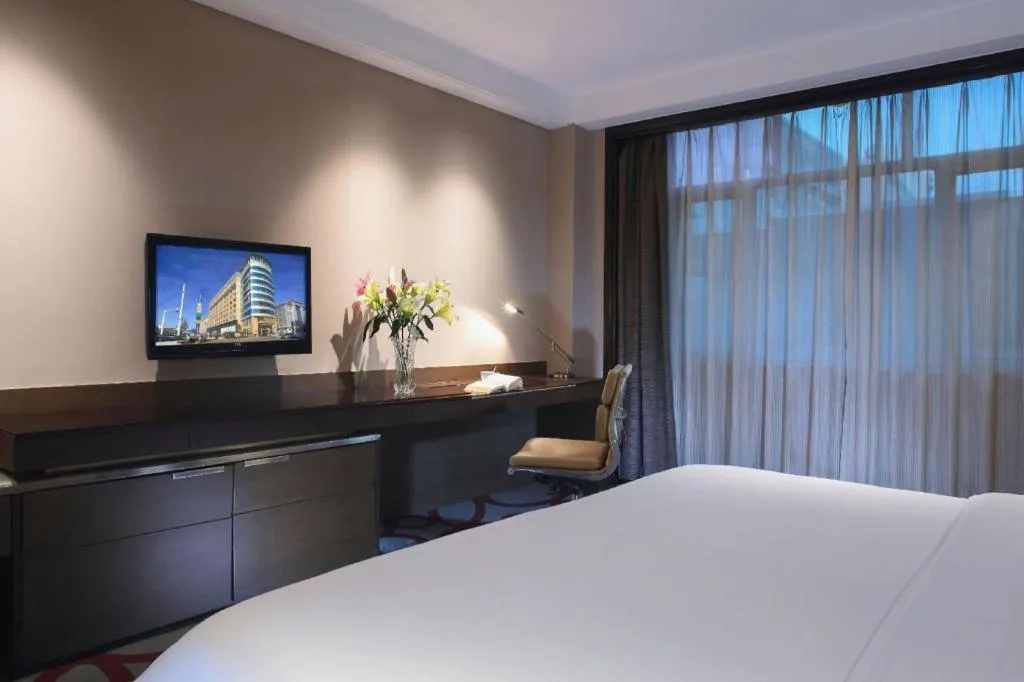 Bed in Dongguan Silver World Garden Hotel