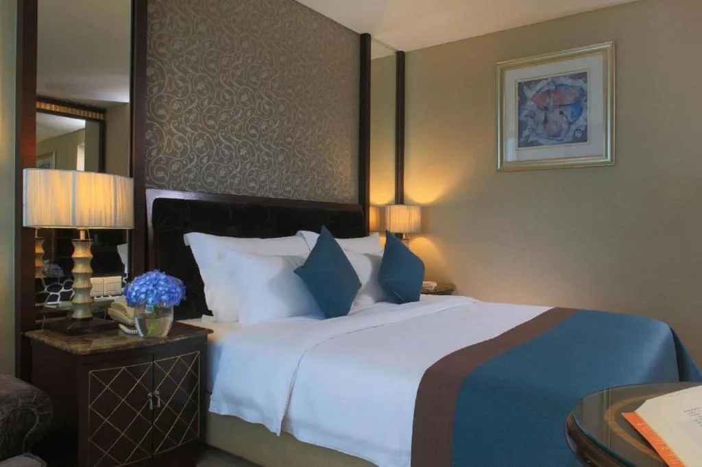 Bed in Dongguan Silver World Garden Hotel