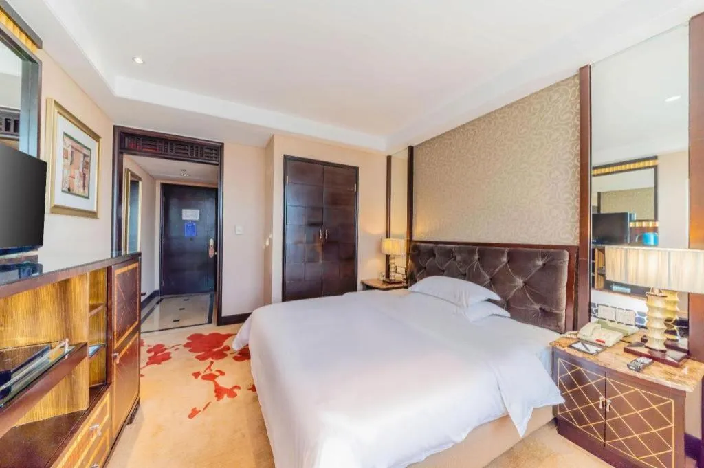 Bed in Dongguan Silver World Garden Hotel