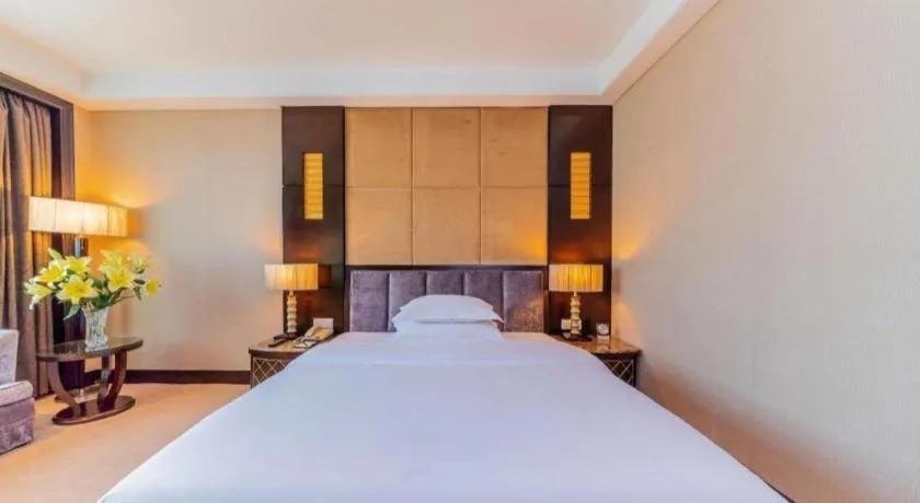 Bed in Dongguan Silver World Garden Hotel