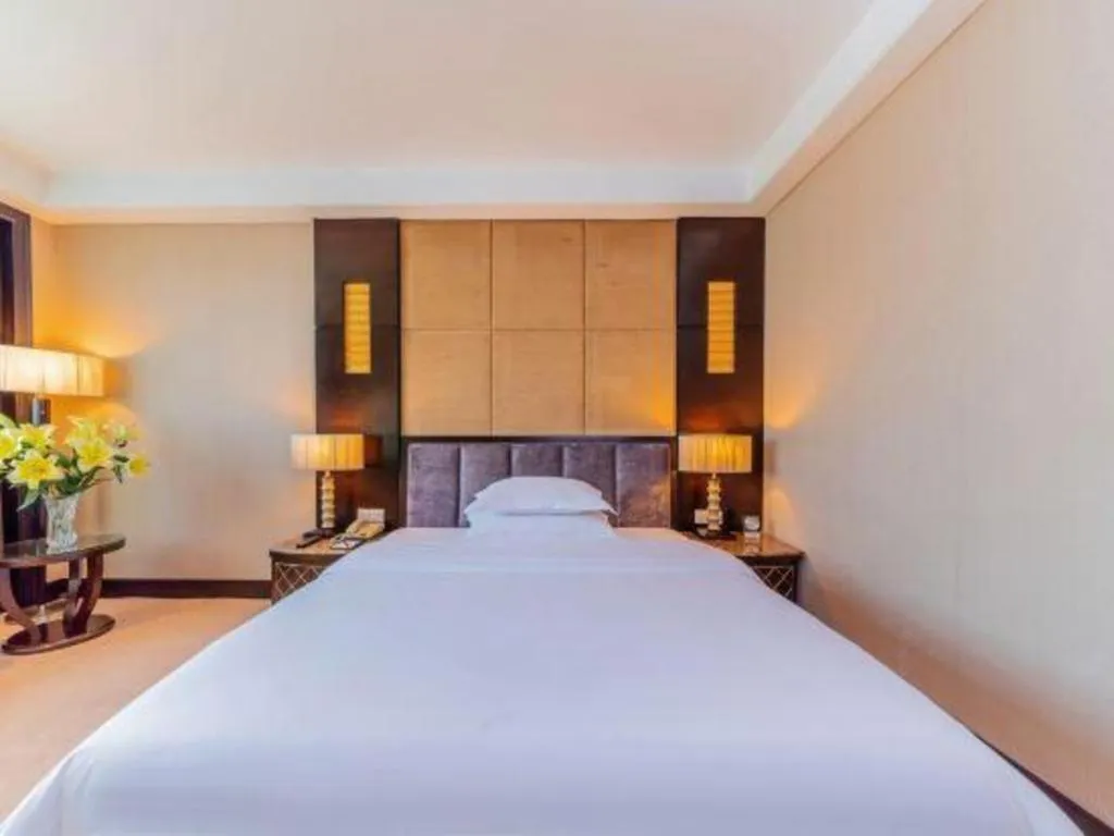 Bed in Dongguan Silver World Garden Hotel
