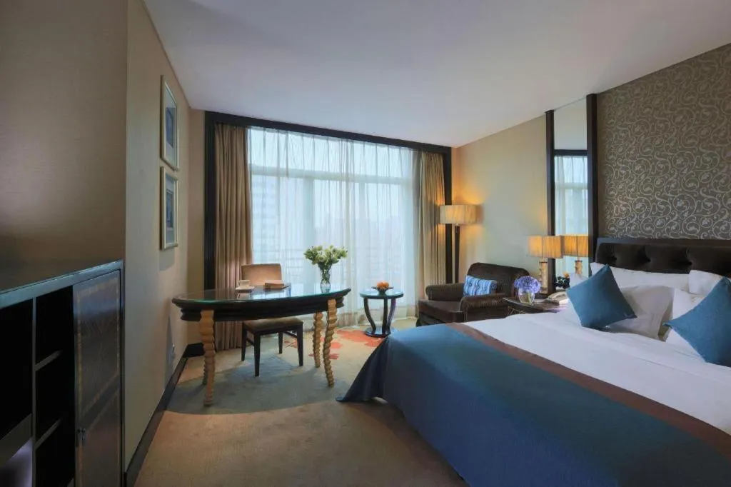 Bed in Dongguan Silver World Garden Hotel