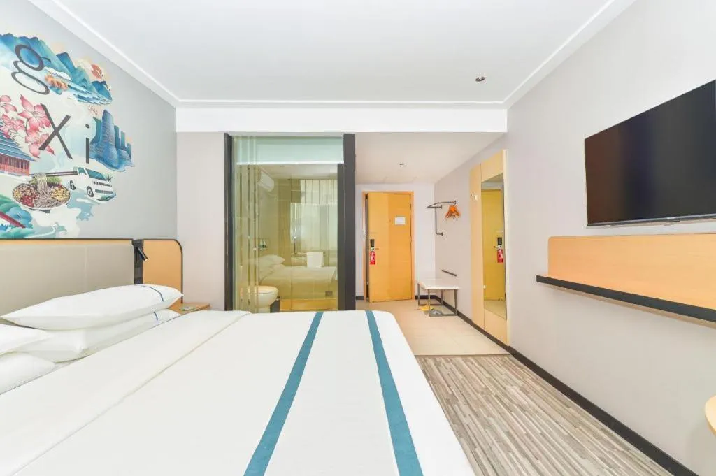 Bed in City Comfort Inn Liuzhou Ma'anshan Rongjun Road