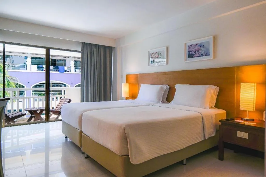 Bed in Ramada by Wyndham Phuket Southsea
