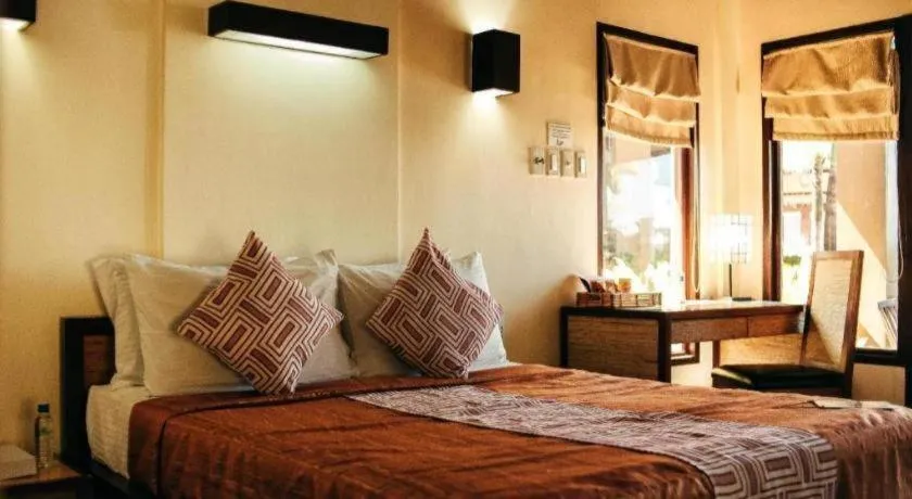 Bed in Kahuna Beach Resort and Spa