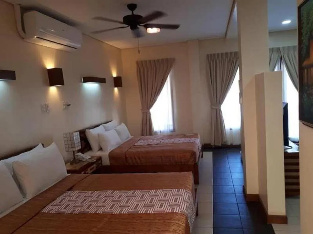 Bed in Kahuna Beach Resort and Spa