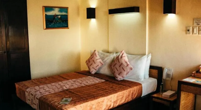 Bed in Kahuna Beach Resort and Spa