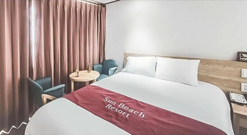 Bed in Jeju Sunbeach Hotel & Resort