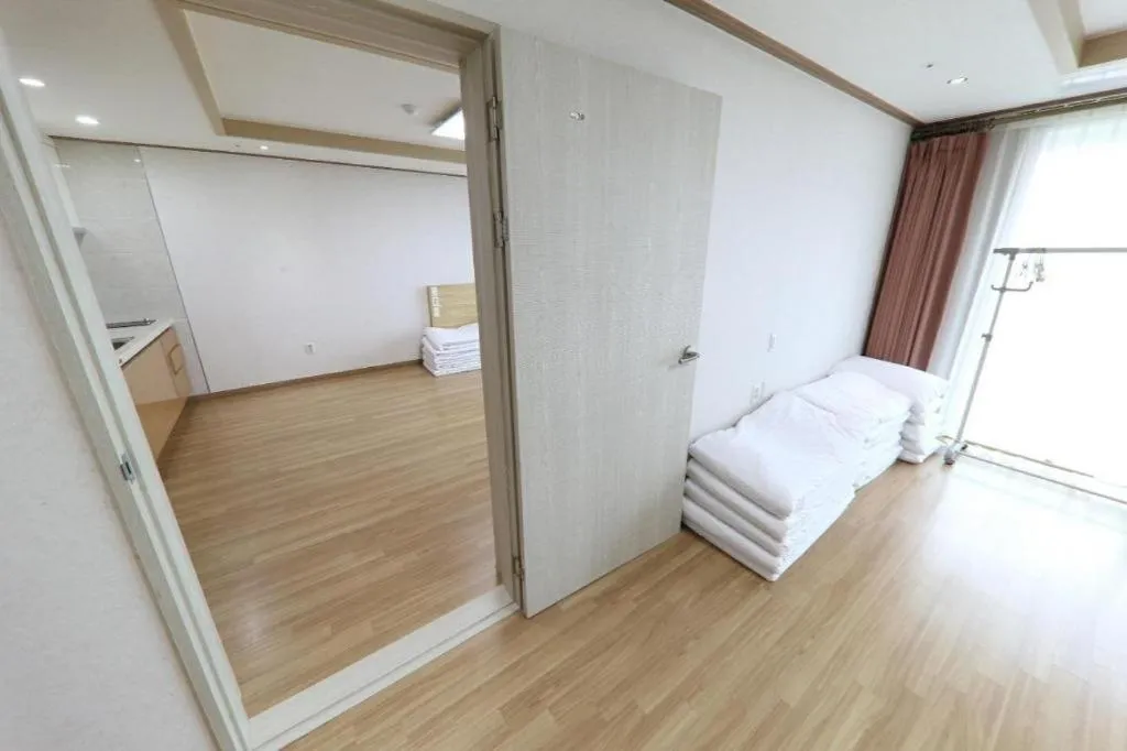 Bed in Jeju Sunbeach Hotel & Resort