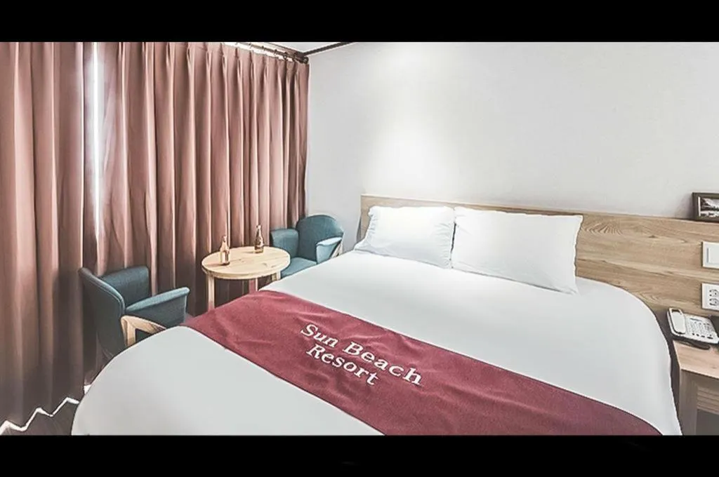 Bed in Jeju Sunbeach Hotel & Resort