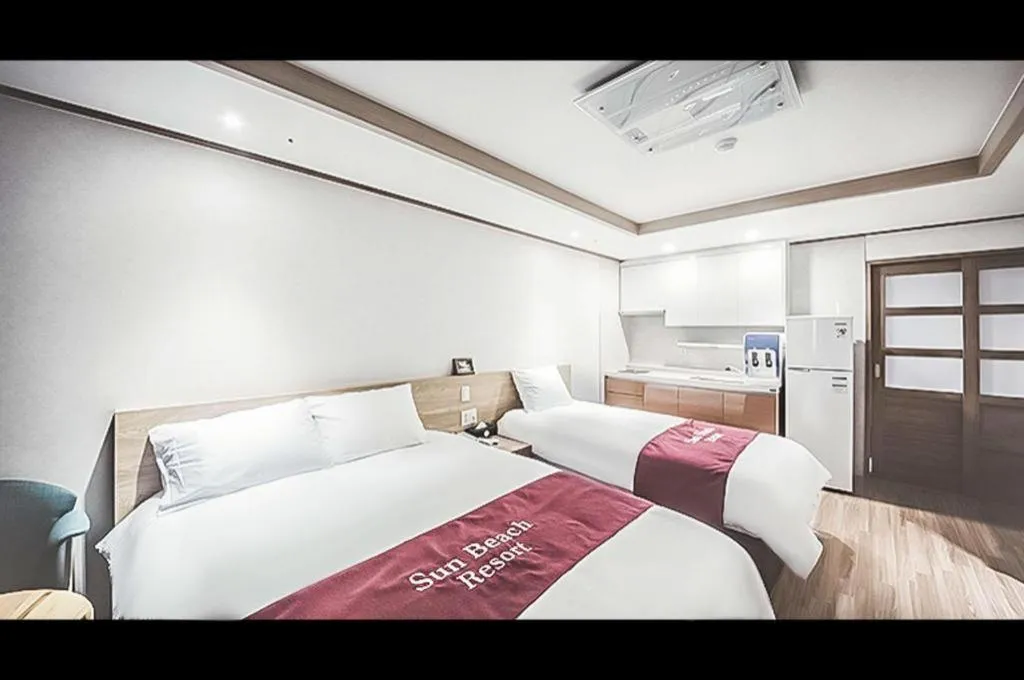 Bed in Jeju Sunbeach Hotel & Resort