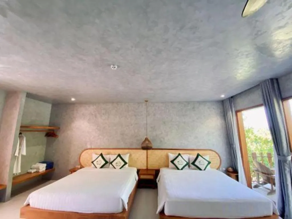 Bed in KyCo Peninsula Quy Nhon Resort