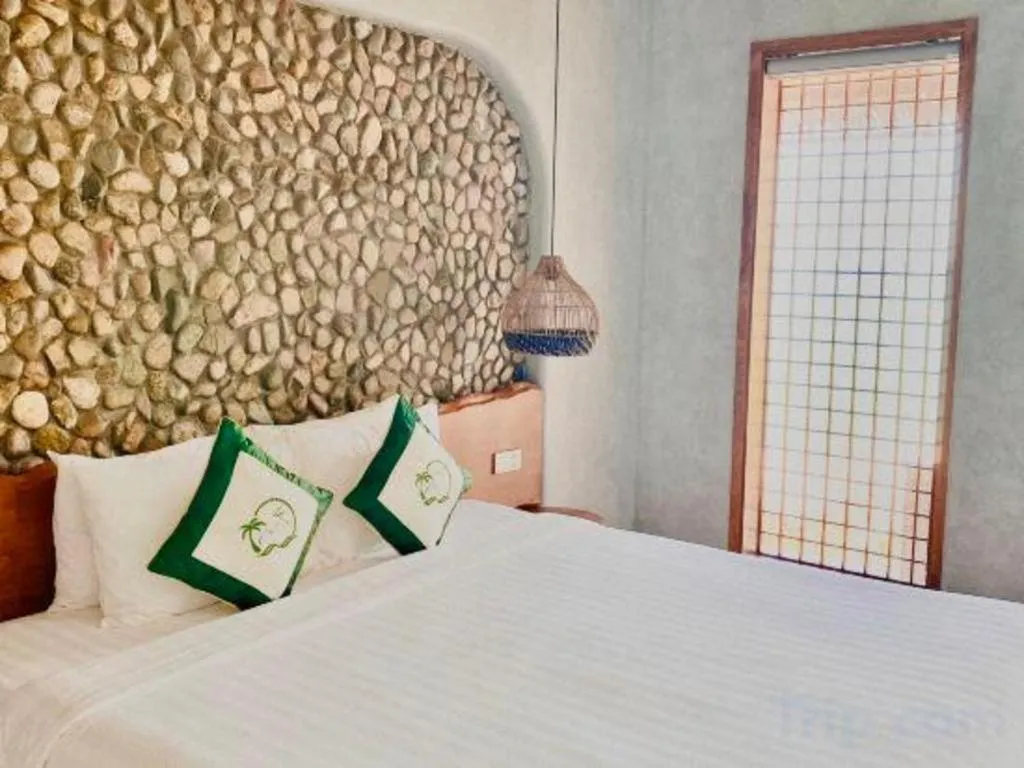 Bed in KyCo Peninsula Quy Nhon Resort