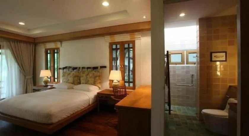 Bed in Chiangkham Luang Resort