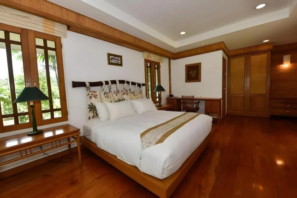 Bed in Chiangkham Luang Resort