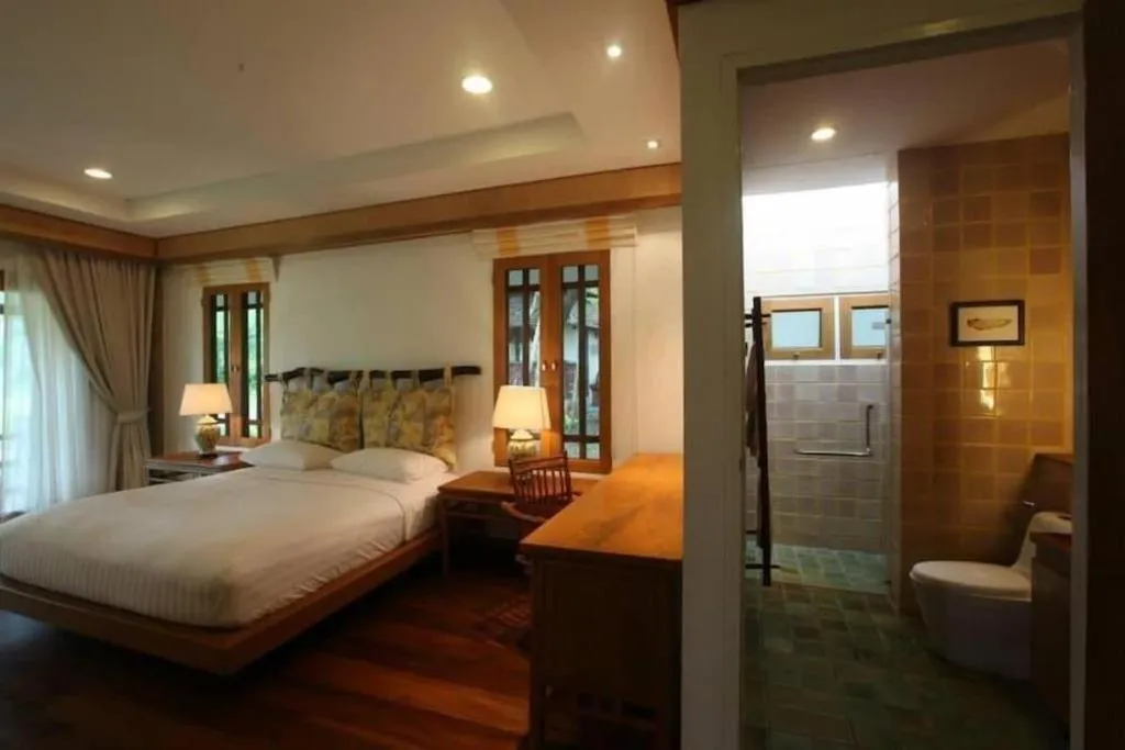 Bed in Chiangkham Luang Resort