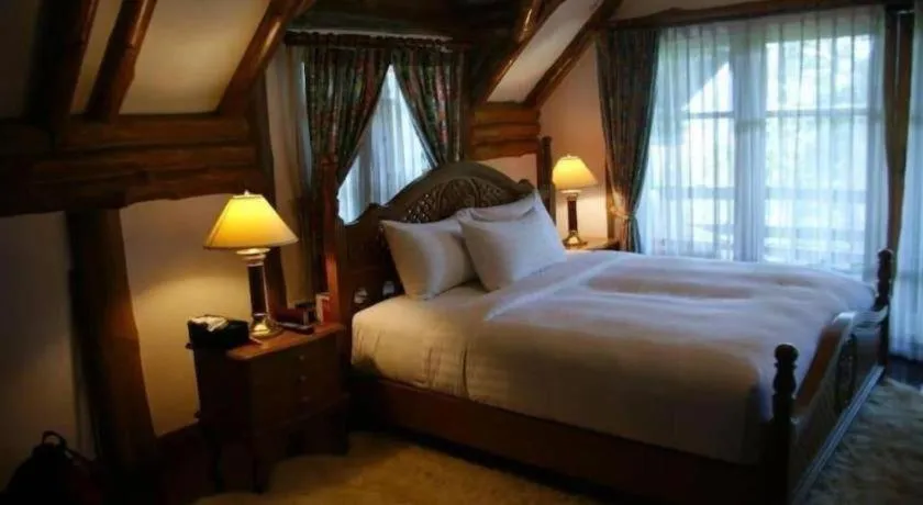 Bed in Chiangkham Luang Resort