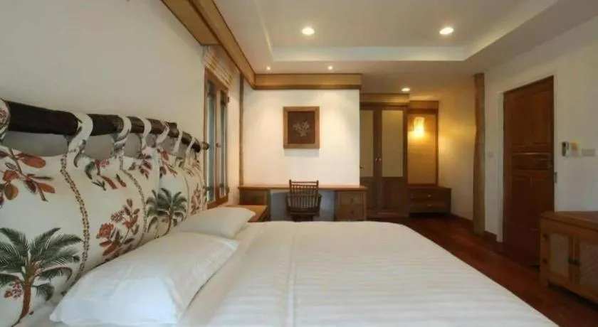 Bed in Chiangkham Luang Resort