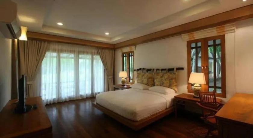 Bed in Chiangkham Luang Resort