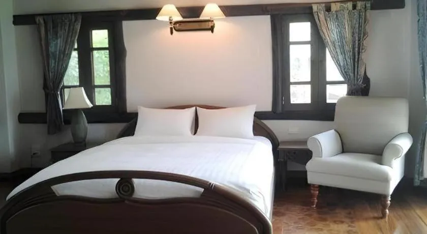Bed in Chiangkham Luang Resort