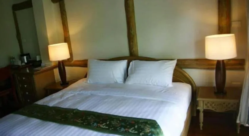 Bed in Chiangkham Luang Resort