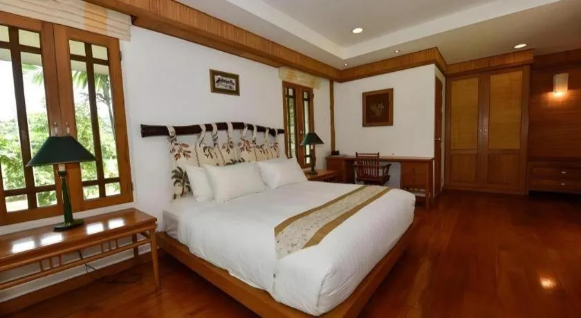 Bed in Chiangkham Luang Resort