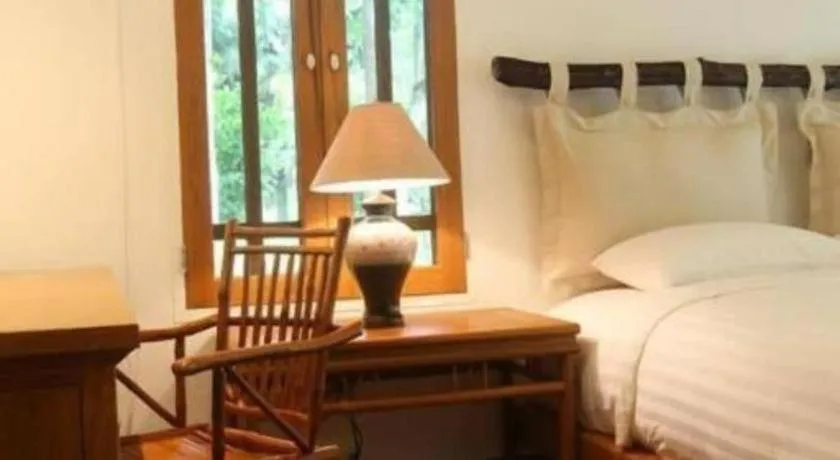 Bed in Chiangkham Luang Resort