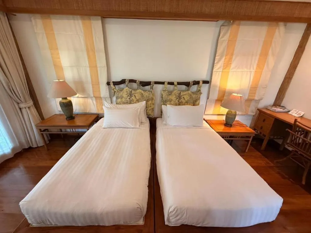 Bed in Chiangkham Luang Resort