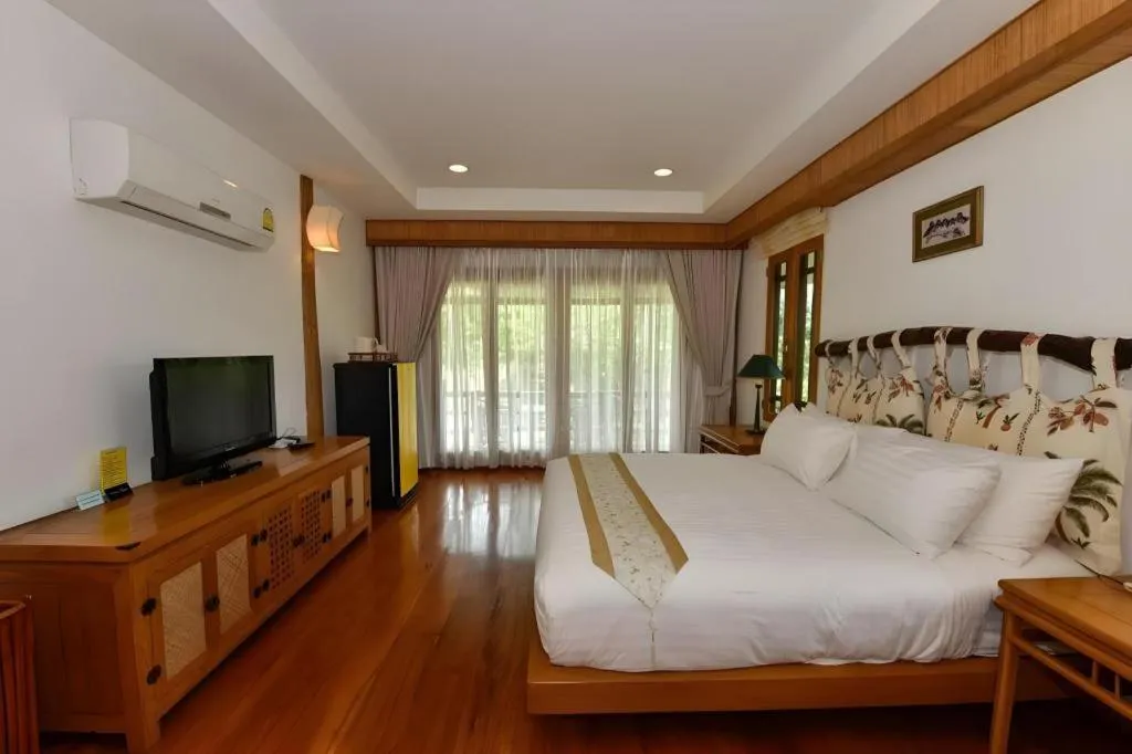 Bed in Chiangkham Luang Resort