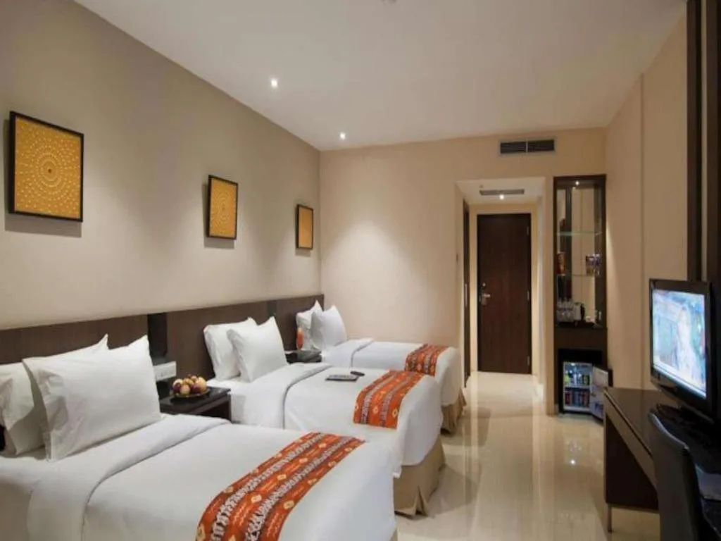 Bed in Aria Barito Hotel