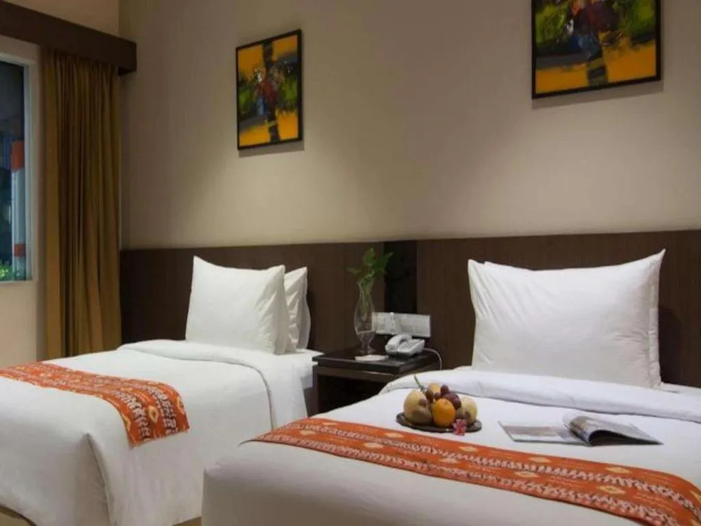 Bed in Aria Barito Hotel