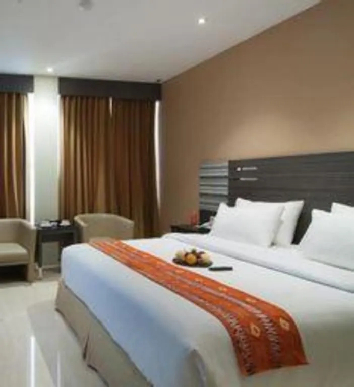 Bed in Aria Barito Hotel