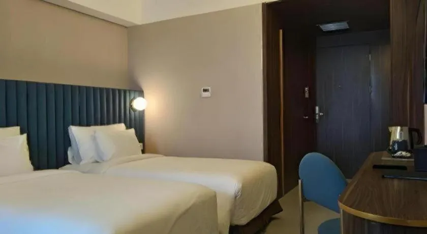 Bed in The Bono Hotel Pekanbaru