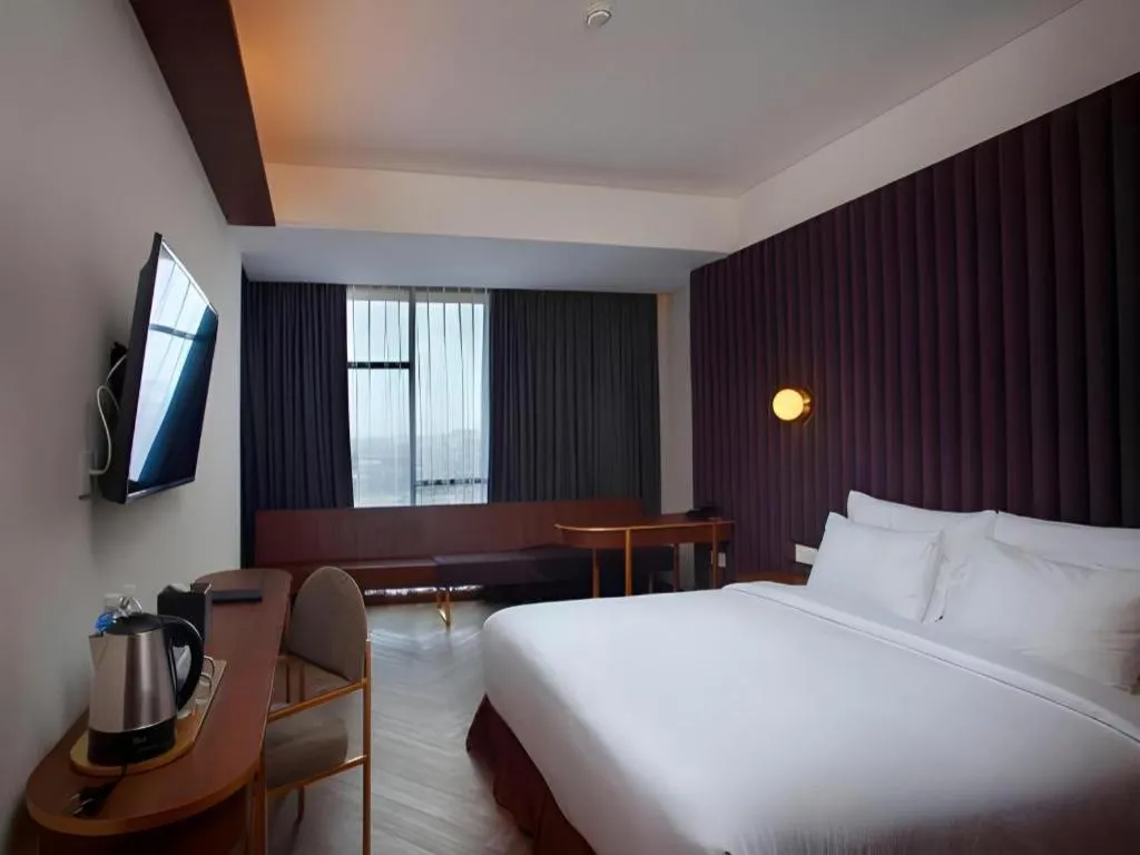 Bed in The Bono Hotel Pekanbaru