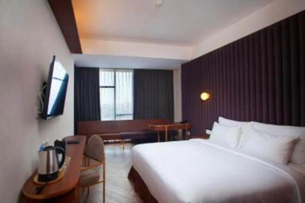 Bed in The Bono Hotel Pekanbaru