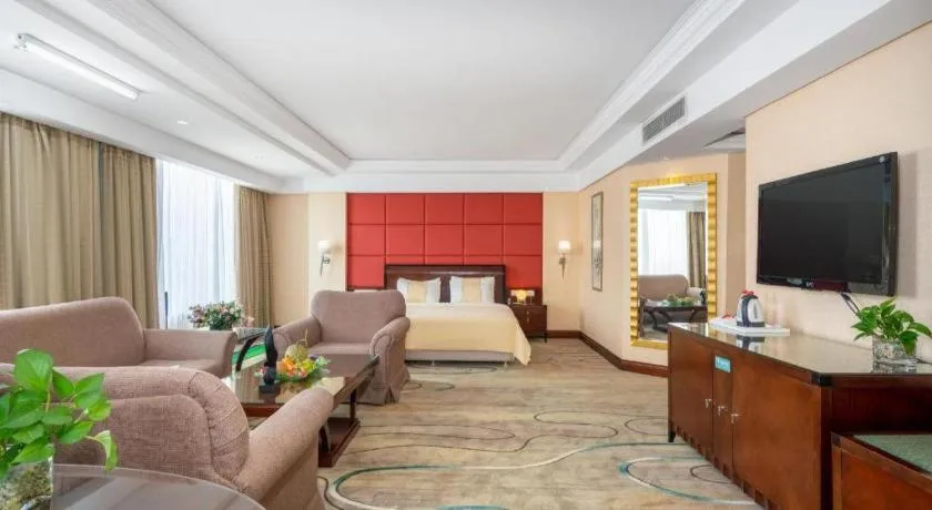 Bed in Chinflux Mandarin Hotel