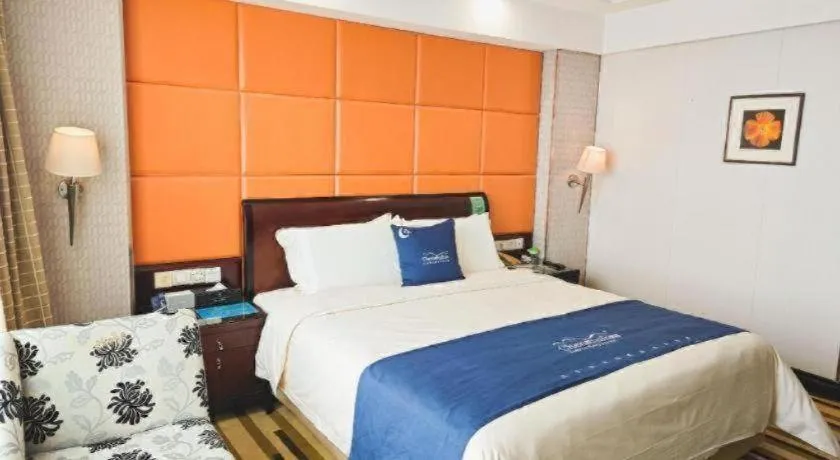 Bed in Chinflux Mandarin Hotel