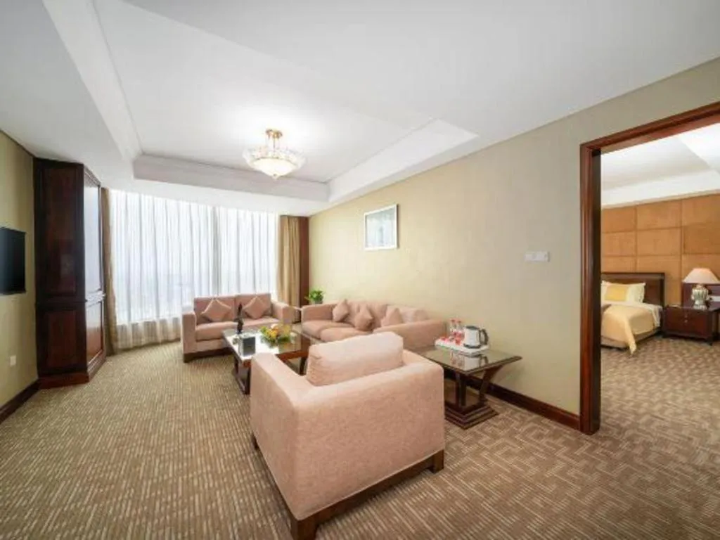 Bed in Chinflux Mandarin Hotel