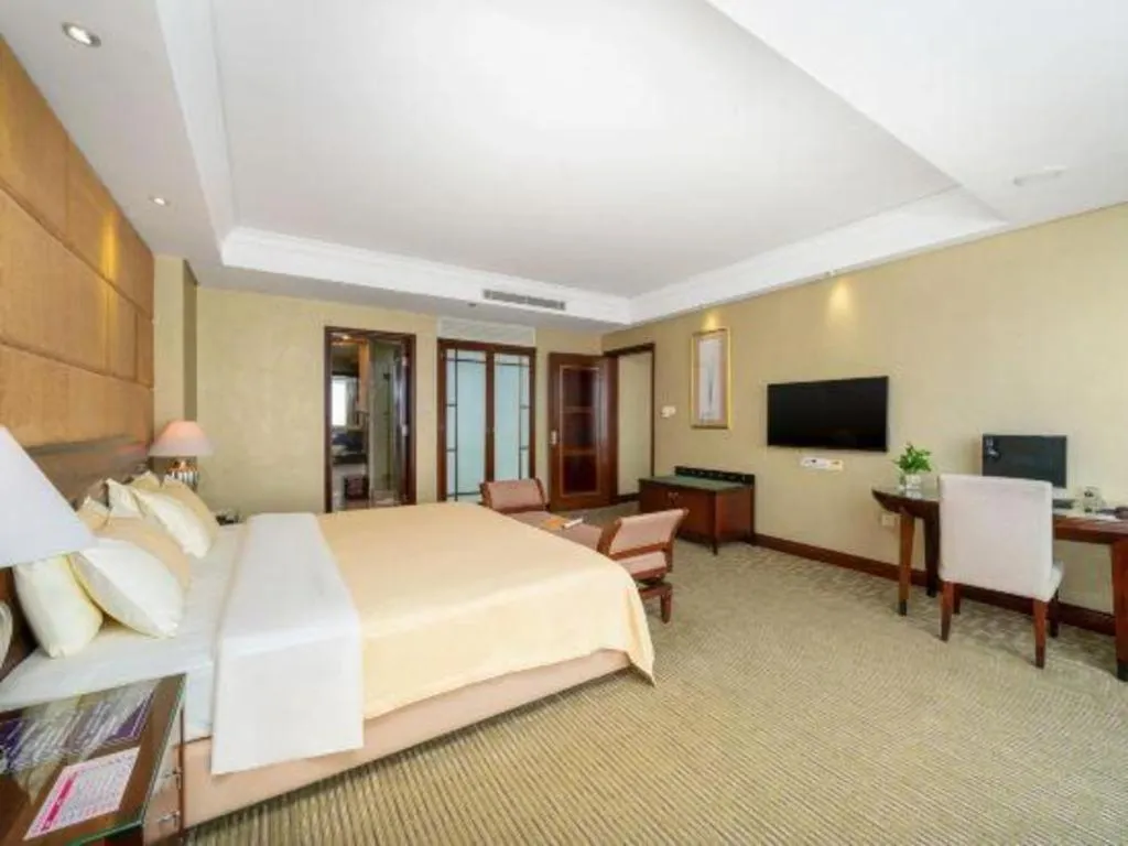 Bed in Chinflux Mandarin Hotel