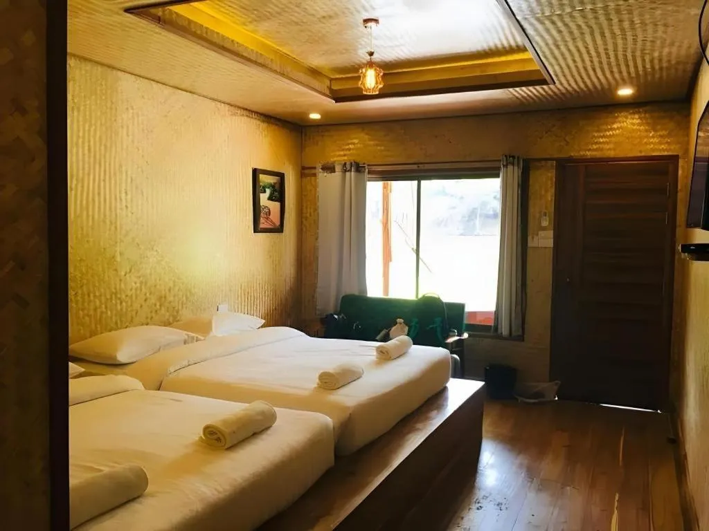 Bed in Tayan Resort Kanchanaburi