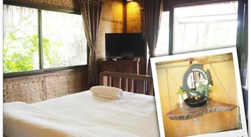 Bed in Tayan Resort Kanchanaburi