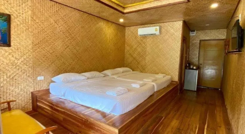 Bed in Tayan Resort Kanchanaburi