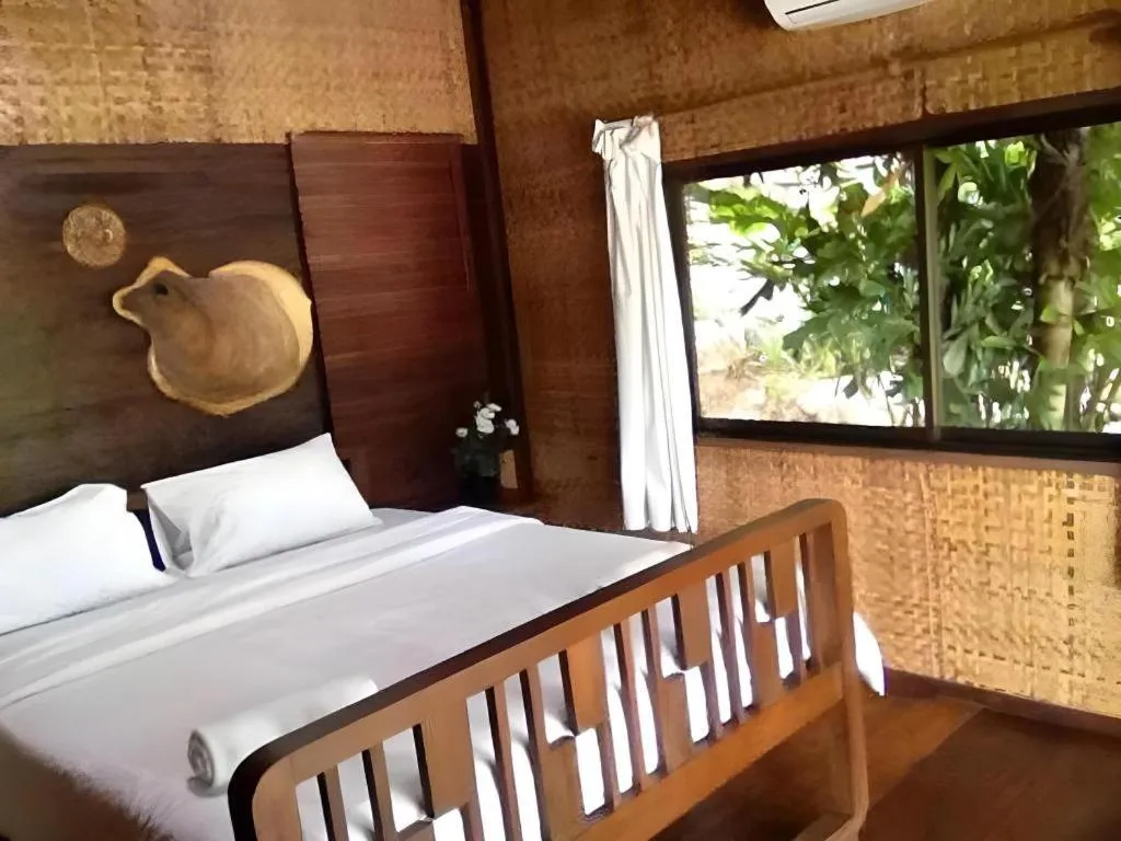 Bed in Tayan Resort Kanchanaburi