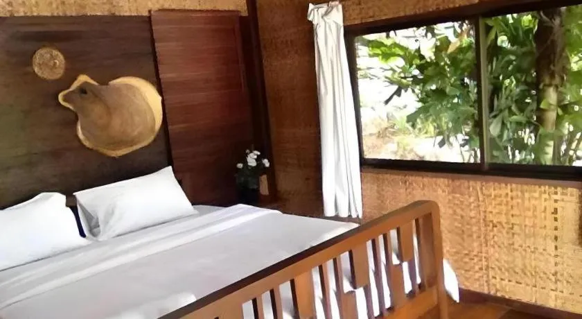 Bed in Tayan Resort Kanchanaburi