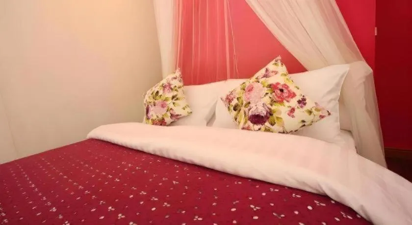 Bed in Tayan Resort Kanchanaburi