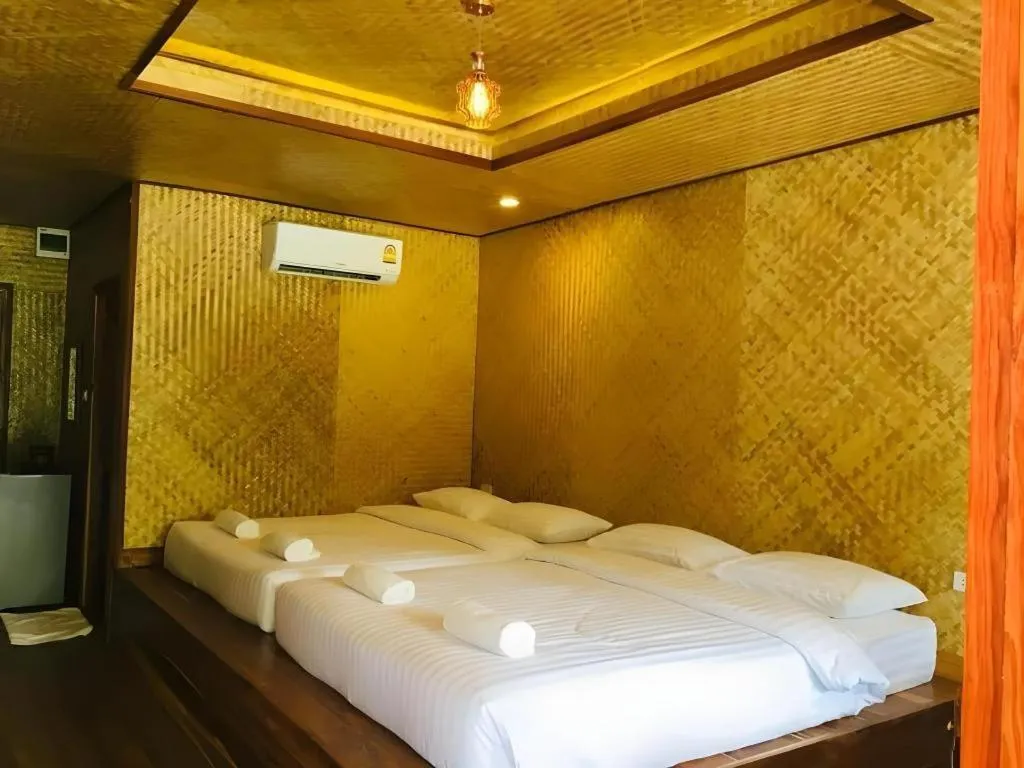 Bed in Tayan Resort Kanchanaburi